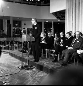 Photograph of Ted Jarvis talking at the official opening of the Phase II buildings (E & F bui...