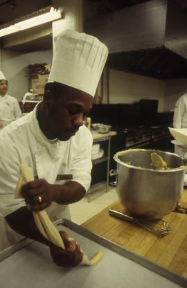Photograph of culinary student at work in the lab
