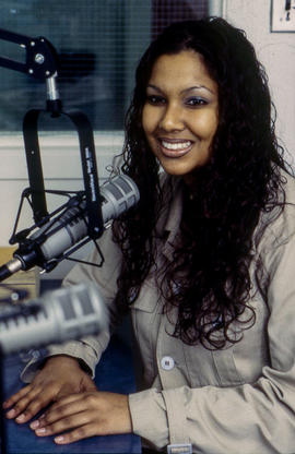 Photograph of student in Humber radio broadcasting studio