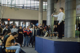 Photograph of a speaker onstage at Winter Humberland