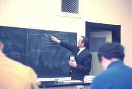 Joe Enekes teaching electronics class : [photograph]
