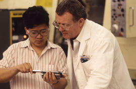 Photograph of an Instructor With a Student