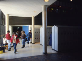 Photograph of students situated by banks of lockers located on the first floor