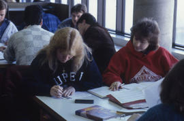 Photograph of students studying in the library