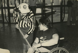 Photograph of Doris Tallon Talking to Someone During the Feel the Wheel Charity Event