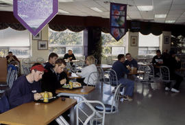 Photograph of students having lunch in the cafeteria