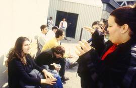 A photograph of students chatting outdoors