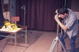 Student in photography studio : [photograph]