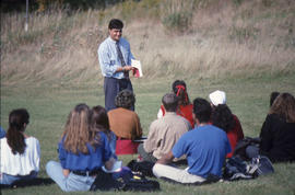 Photograph of a Professor Teaching Outside