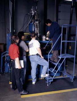Photograph of an Instructor and his students