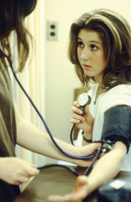 Photograph of nursing students practicing techniques