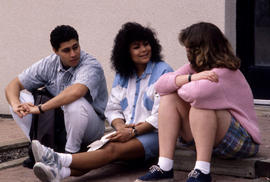 Photograph of students talking outside