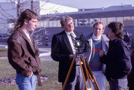 Photograph of students and their Faculty Engineering professor in class outdoors