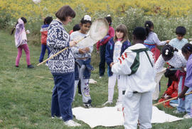 Photograph of Kids at the Arboretum Catching Insects