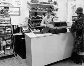 Photograph of an Employee Assisting a Customer at the Service Centre Store