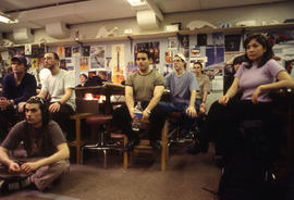A photograph of seated and attentive students in class