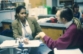 A photograph of two students the Chemistry lab