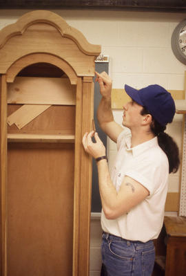 Photograph of a Student In The Cabinet Making Lab
