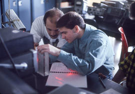 Photograph of two students working together in the Electronics lab