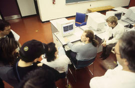 Photograph of students working on drafting assignments