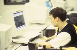 Photograph of a student using the computer