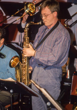 Photograph of a student musician playing a tenor saxophone
