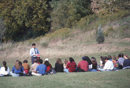 Photograph of a Professor Teaching Outside
