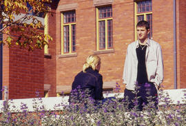 Photograph of students outside a Lakeshore cottage