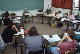 Photograph of Eric Wright and attendees at the School for Creative Writing workshop