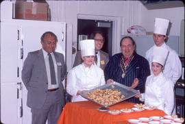 Photograph of Chef Students Presenting Freshly Baked Goods