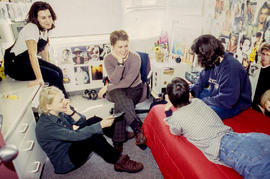 Photograph of students gathered together and chatting in one of the residence dorm