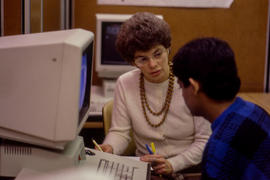 Photograph of an Instructor Working with a Student
