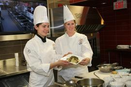 Students show food created at School of Culinary Arts & Science Gala opening : [photograph]