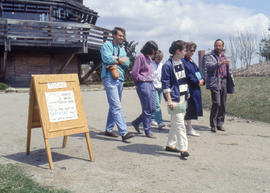 Photograph of Sidney Baller leading a tour through the Arboretum