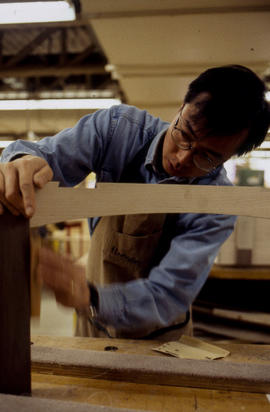 Photograph of student working in the woodworking lab