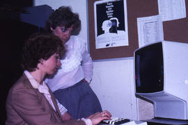 Photograph of Jane Smith operating the computer
