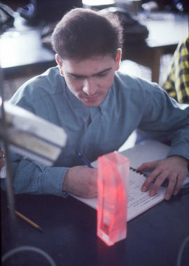 Photograph of student working in the Electronics lab