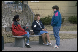 Photograph of students in conversation outdoors