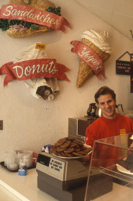 Photograph of a coffee and snack shop attendant