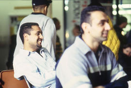 A photograph of students sitting amongst each other