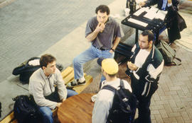 A photograph of a group of students having lunch