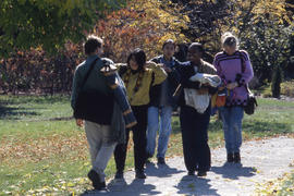 Photograph of a group of students on a trail in the Arboretum