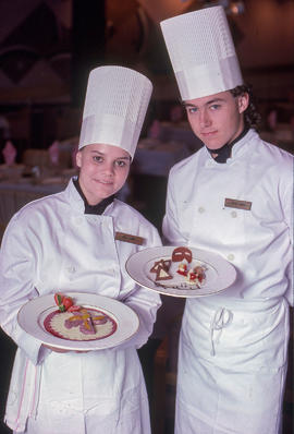 Photograph of Hospitality students with created food products
