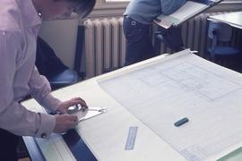 Student in a drafting classroom : [photograph]