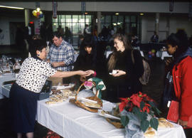 Photograph of Ellie Salamon and Bill Pitt at a bake sale