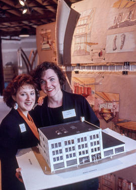 Photograph of two students from the architectural programme
