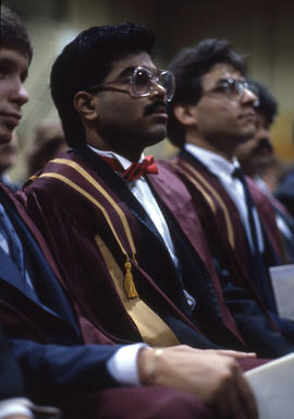 Photograph of graduating students sitting in the audience