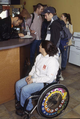 Photograph of students at residence desk