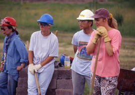 Photograph of the grounds keeping crew ready to work