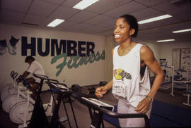 Photograph of a student exercising in the gym
